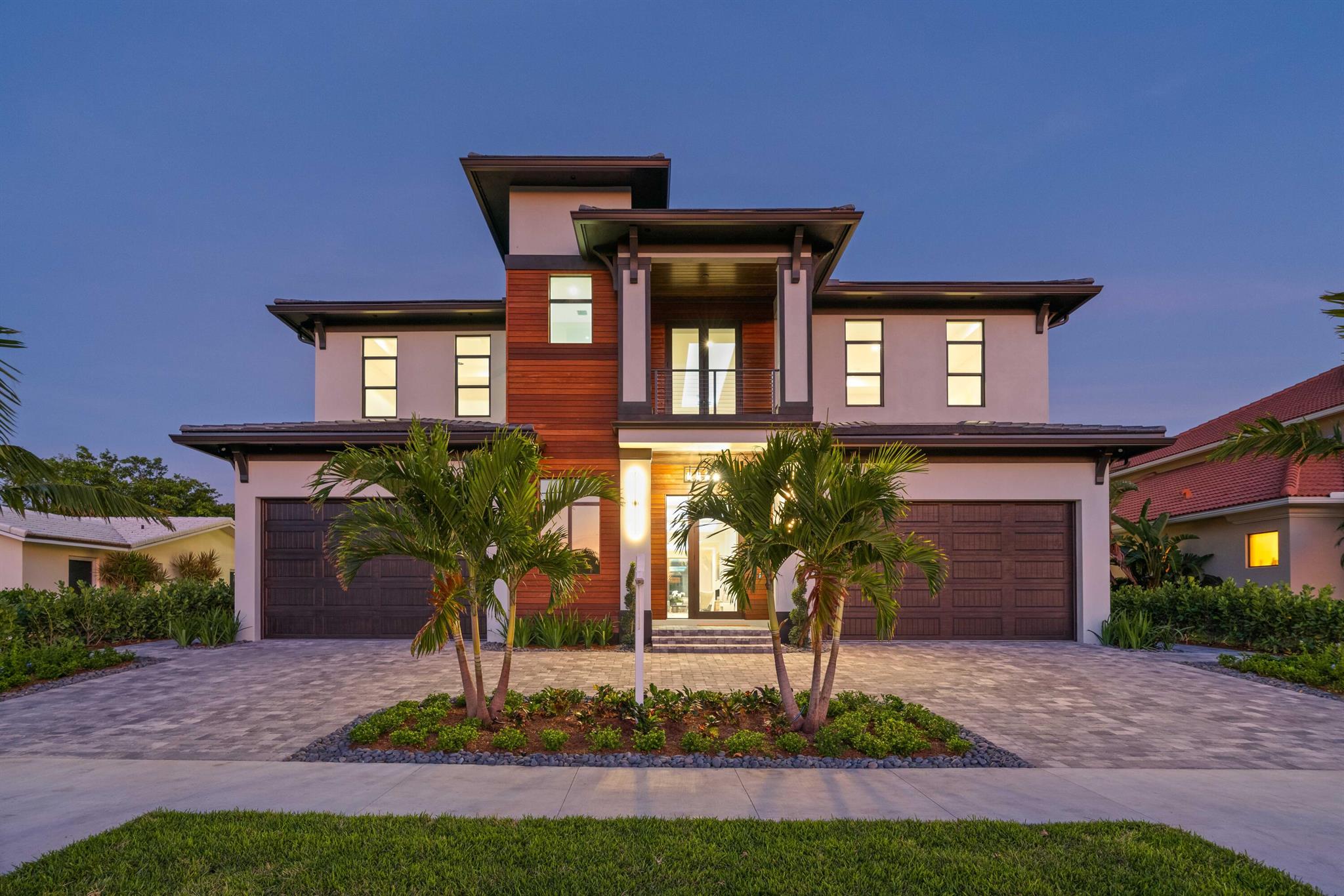 Brand new custom waterfront home! Developed by High Tide Waterfront Properties, this residence offers multiple docks for your largest vessels in an expansive protected basin. Boasting over 8,000 sq ft of AC living space this residence has ample space for entertaining guests while showcasing water views and luxury outdoor-indoor lifestyle. Offering a down stairs and upstairs primary suites, up stairs and down stairs family as well as living rooms, an elevator, custom wine display, no shortage of smart home features and utilizing green technology for increased efficiency. 736 Lagoon offers a four and half car garage with appropriate volume for car lifts. Stunning backyard landscape lighting, heated salt water infinity pool for breathtaking views, a custom spa with fire feature& so much more