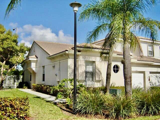 Photo of 3133 ENCLAVE Way, Lauderhill, FL 33319 (MLS # B26064870)