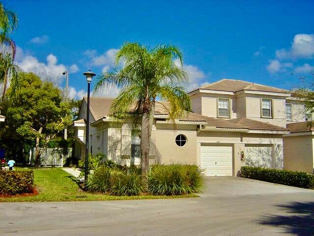 Photo of 3133 ENCLAVE Way, Lauderhill, FL 33319 (MLS # B26064870)