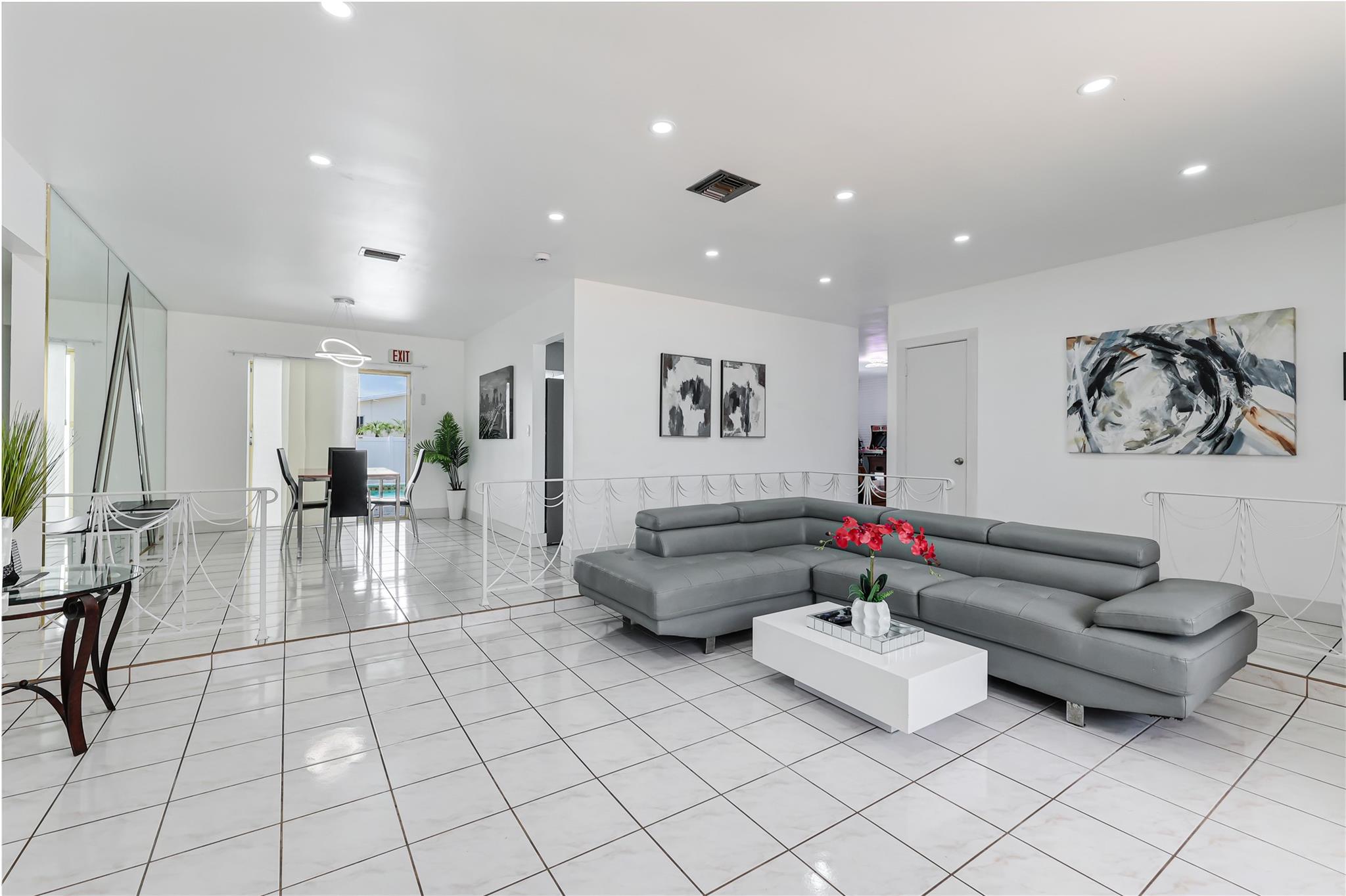Welcome to 5400 W Park Road, a beautifully updated 3-bedroom, 2-bathroom single-family home with a resort-style atmosphere, perfect for relaxation and entertaining. This spacious home features an open layout with abundant natural light, a modern kitchen, stylishly designed furniture, and a private game room for endless indoor fun. Step outside to your own tropical retreat—complete with a private pool and a large fenced yard ideal for lounging or hosting guests. Additional highlights include 2 car garage with laundry room, ample storage, and plenty of parking. Located just minutes from the Hard Rock Hotel & Casino, top-rated schools, shopping, dining, i95 and turnpike, this pet-friendly home blends luxury, comfort, and unbeatable convenience. Schedule your private tour today!