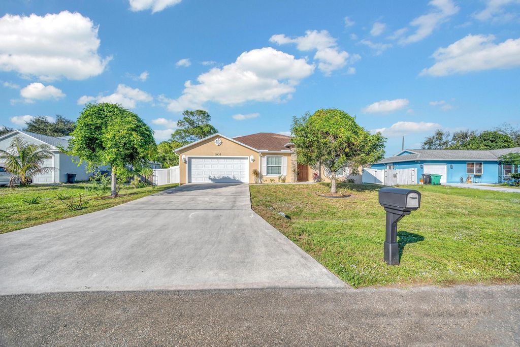 Photo of 1037 SW Payne Avenue, Port Saint Lucie, FL 34953 (MLS # R11168807)