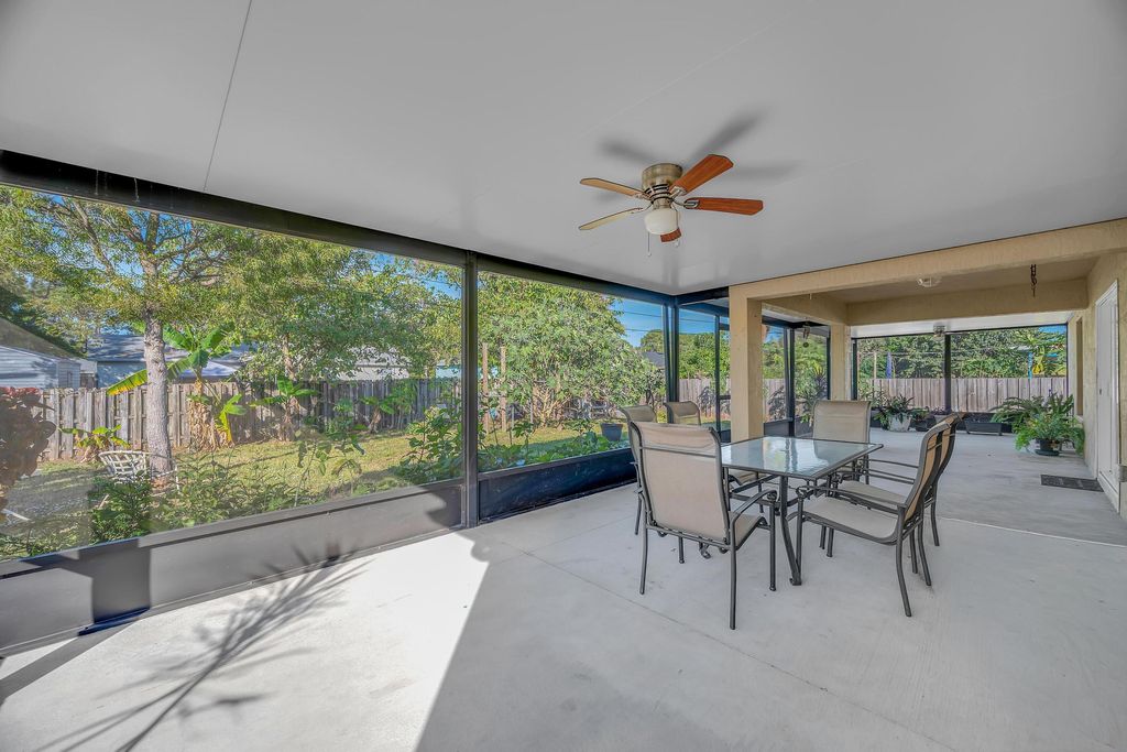 Photo of 1037 SW Payne Avenue, Port Saint Lucie, FL 34953 (MLS # R11168807)