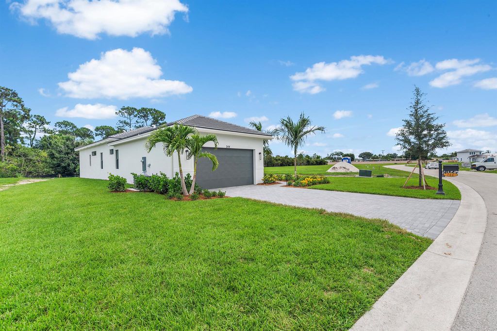 Photo of 244 SE Via Sangro, Port Saint Lucie, FL 34952 (MLS # R11000896)