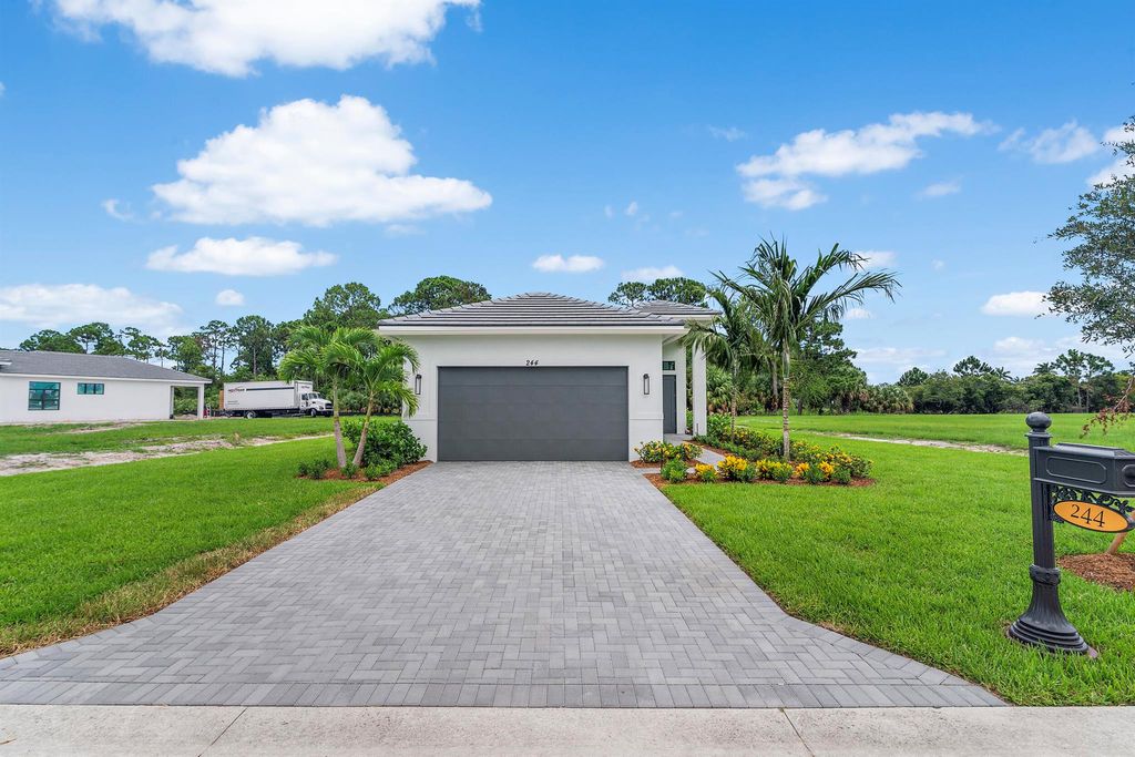 Photo of 244 SE Via Sangro, Port Saint Lucie, FL 34952 (MLS # R11000896)