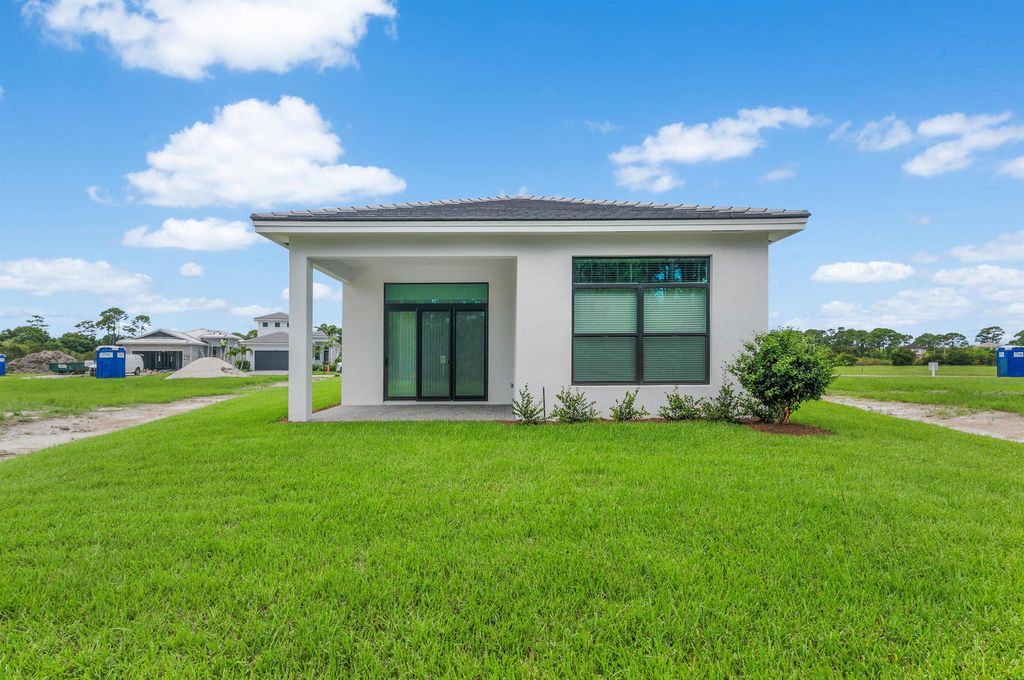 Photo of 244 SE Via Sangro, Port Saint Lucie, FL 34952 (MLS # R11000896)