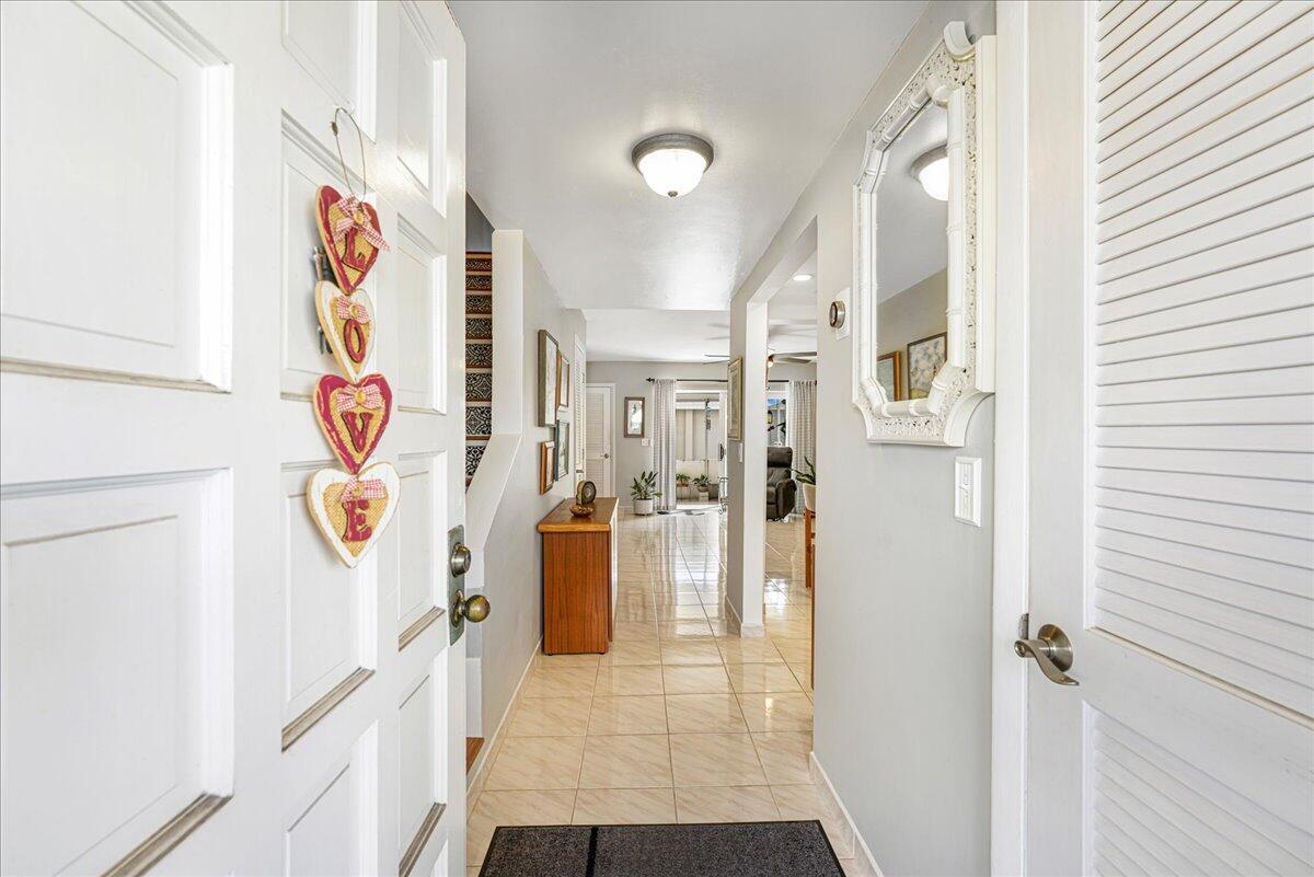 LOVELY WELL KEPT 2BED 2.5BATH TOWNHOUSE.ALL AGES IN A PRIME LOCATION EAST OF US1. CLOSE TO CANALS, BEACH 1.5 MILES AWAY, shopping, restaurants, supermarkets and beautiful houses. This larger unit boosts on the 1st fllor, an open concept living room, covered screened patio, kitchen w/granite countertops, pantry, lots of storage & half bath. Upstairs 2 Suites (spacious master w/crown molding, darkening shades, plenty of storage, bath w/larger shower & linen closet; 2nd suite w/built in office desk & Murphy bed. WASHER & DRYER w/hanger. Electrical Panel-2024, Impact Windows/doors-2022. Shutters, roof 2021, A/C2022, Microwave2024, Nest Thermostat, ring doorbell, Carport w/storage. No assessment.Comm,heated pool. NO RENTALS. Buyer/Buyer's Agent pls. double check all information.