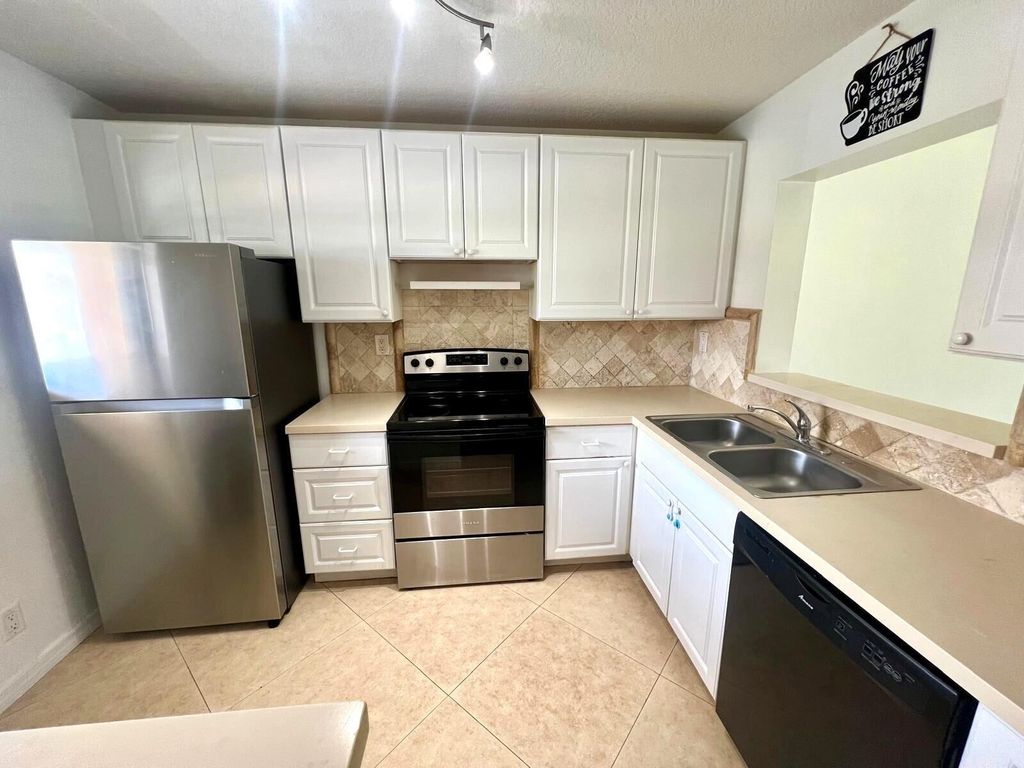 Photo of 9431 Boca Cove Circle #1016, Boca Raton, FL 33428 (MLS # R11097994)