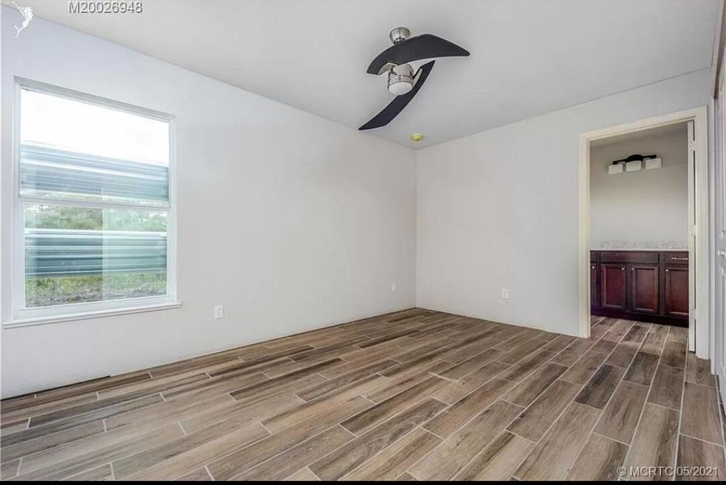 Photo of 170 SW Pilsner Circle, Port Saint Lucie, FL 34953 (MLS # B26027173)