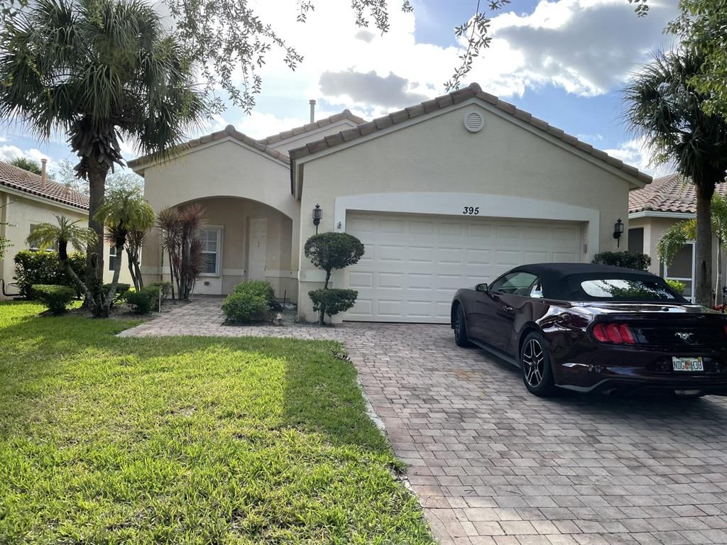 Photo of 395 NW Breezy Point Loop, Port Saint Lucie, FL 34986 (MLS # R10711824)
