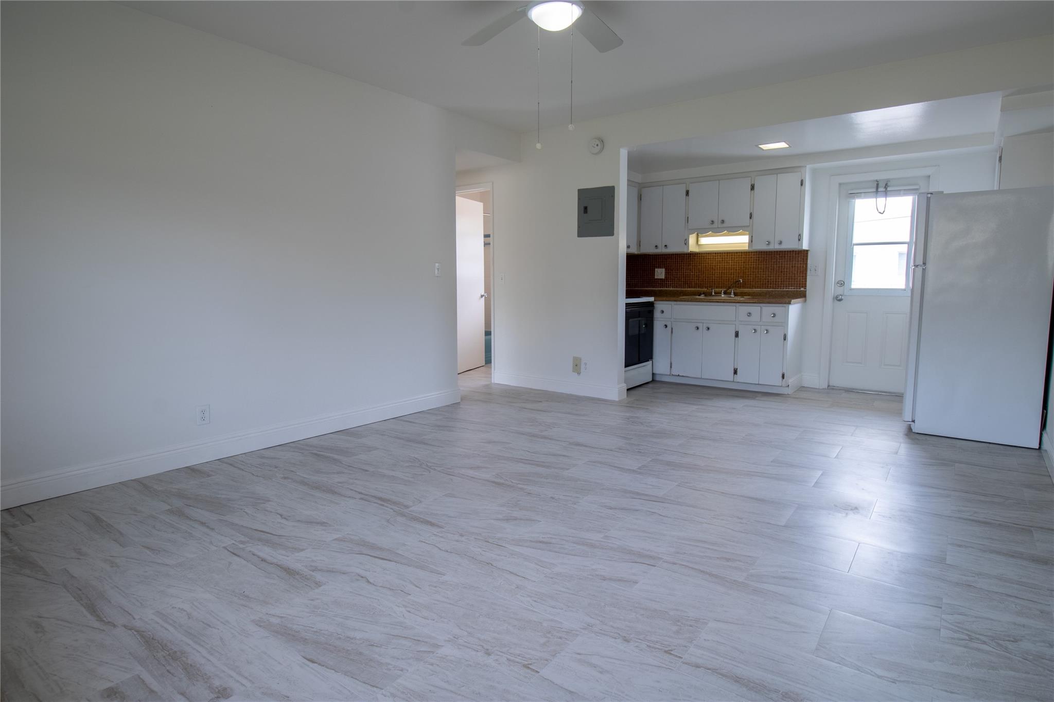 This unit is fully tiled, has 2 new a/c units and is available for immediate move in. The large bedroom has a very large walk-in closet for your clothing and storage needs, and there is a closet just outside the bathroom for linens and additional storage. Monthly rent includes water, sewer, trash removal services, pool maintenance, pest control services, and landscaping.