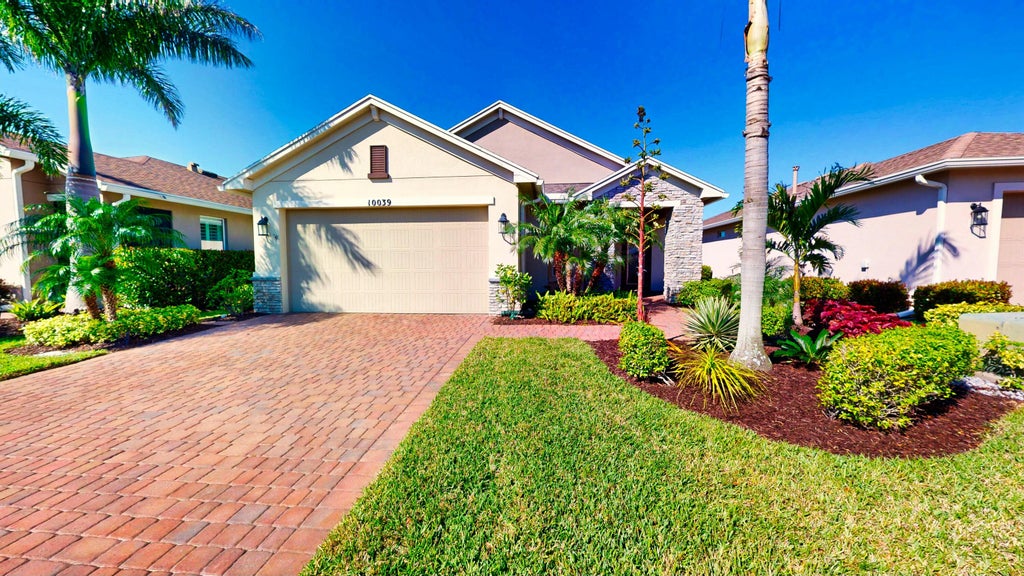 Photo of 10039 SW Indian Lilac Trail, Port Saint Lucie, FL 34987 (MLS # R11072668)
