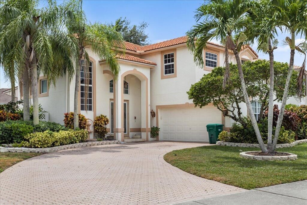 Photo of 5710 NW 62nd Street, Parkland, FL 33067 (MLS # R11117041)