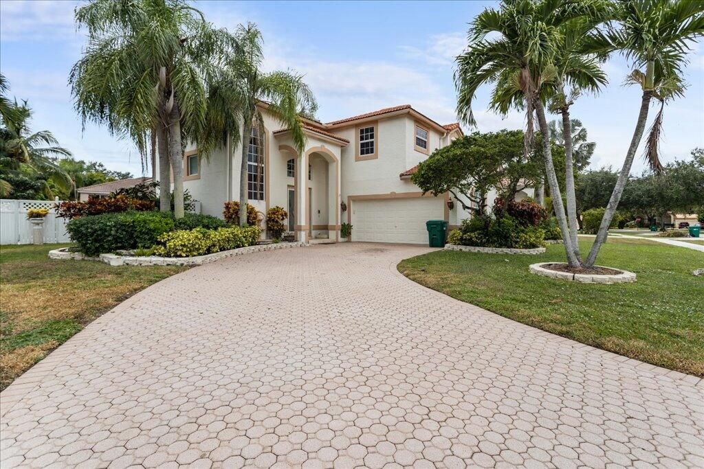 Photo of 5710 NW 62nd Street, Parkland, FL 33067 (MLS # R11117041)