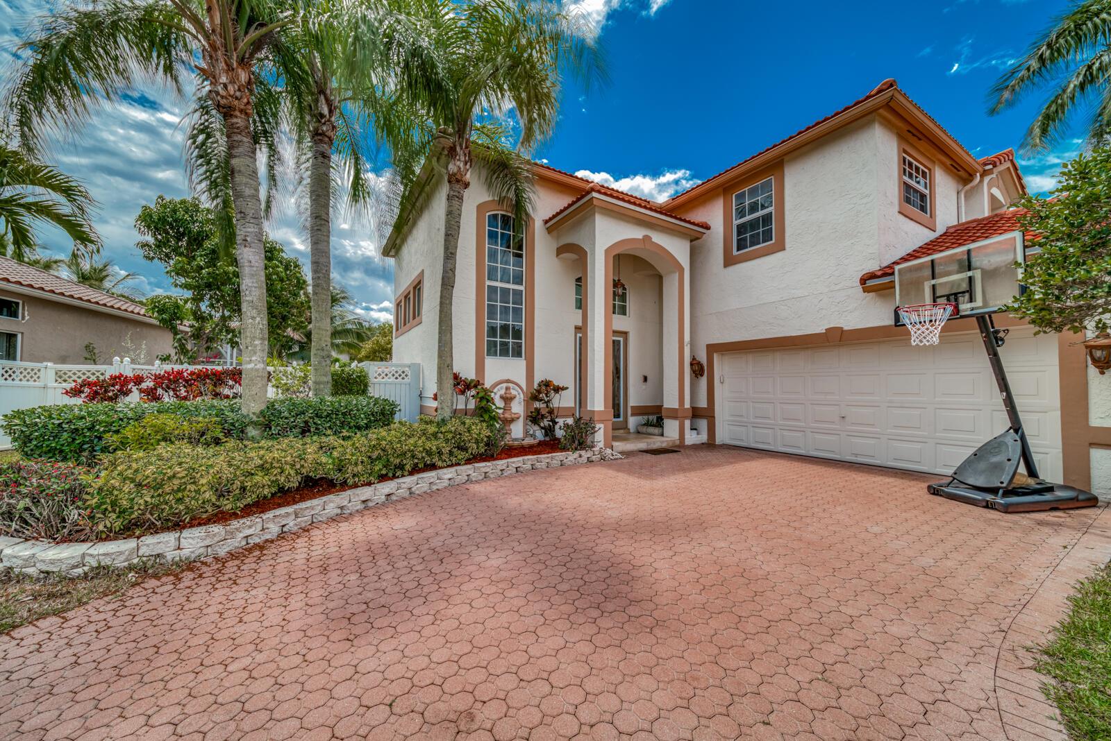 Annual rental available in peaceful and immensely popular Parkland. This spacious 4-bedroom 3-bath pool home is both luxurious and practical. The cathedral ceilings provide both a stately look, and lots of natural light for a bright and airy feel. The practical side of you will love the 2019 tile roof, full impact glass windows and doors throughout, and dual AC units to service both floors separately and efficiently. The kitchen boasts granite counters, wood cabinets, and stainless-steel appliances. The fourth bedroom is located downstairs and can serve as an office and/or the perfect spot for guests. Pool and lawn care are included in the rent and pets are considered on a case-by-case basis. A quick move-in is possible. Located in Sable Pass, a gated community.