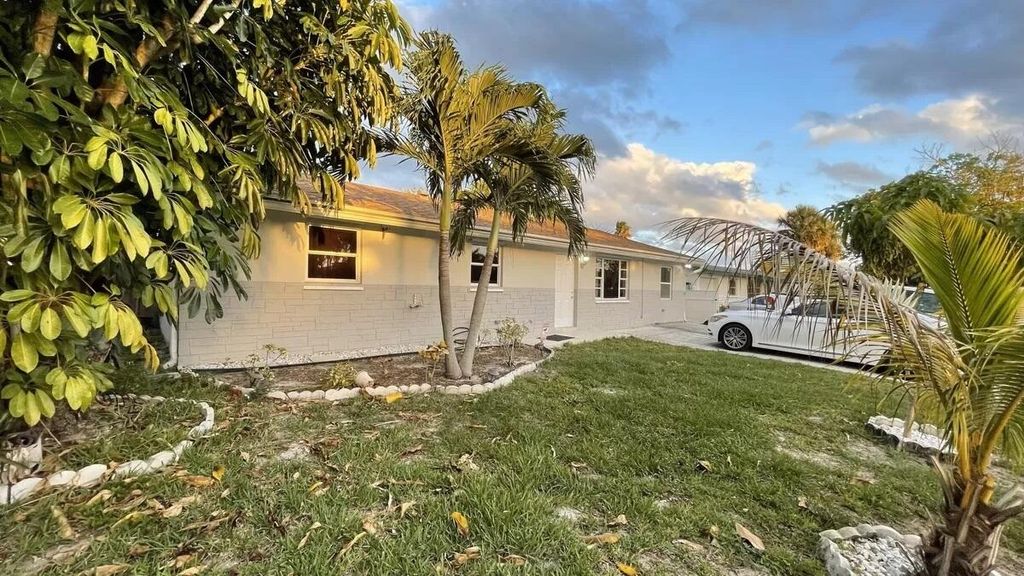 Photo of 9458 Bellewood Street, Palm Beach Gardens, FL 33410 (MLS # R11014368)
