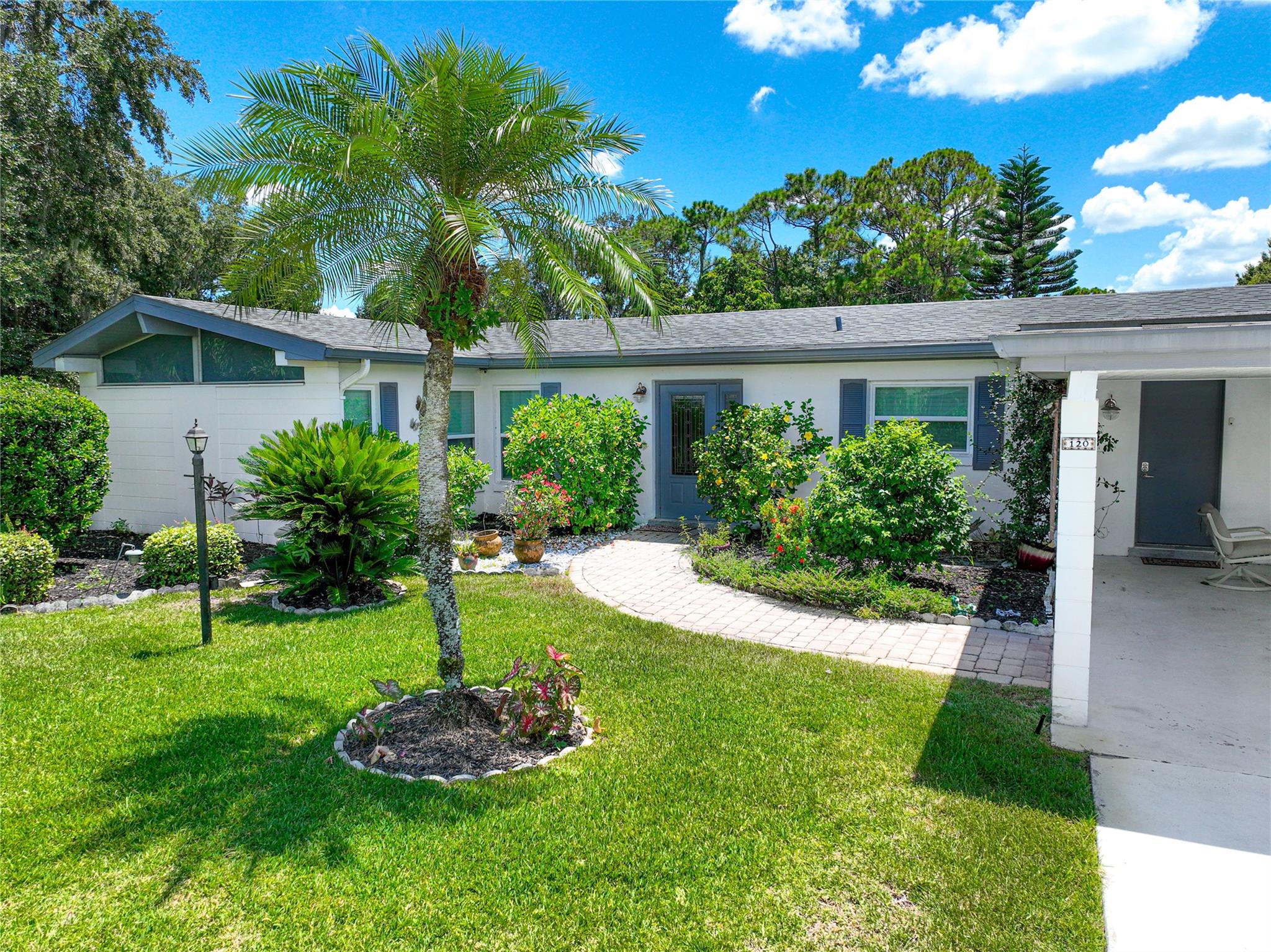 This beautiful one-story 3-bedroom, 3-bath home offers direct canal access to the lake and includes membership to a private community park with a boat ramp for easy lake access. Recently updated with a new roof, new A/C, new flooring, and fresh sod in the backyard, the home provides comfort, style, and peace of mind. Its generous square footage is enhanced by a welcoming porch, outdoor grill, and second refrigerator, creating the perfect setting for entertaining. The adjacent lot also available under MLS #F10521578, this property presents a rare opportunity to combine lifestyle and investment potential. Adding to its value, the home is located within an Opportunity Zone, making it an attractive choice for forward-thinking investors.