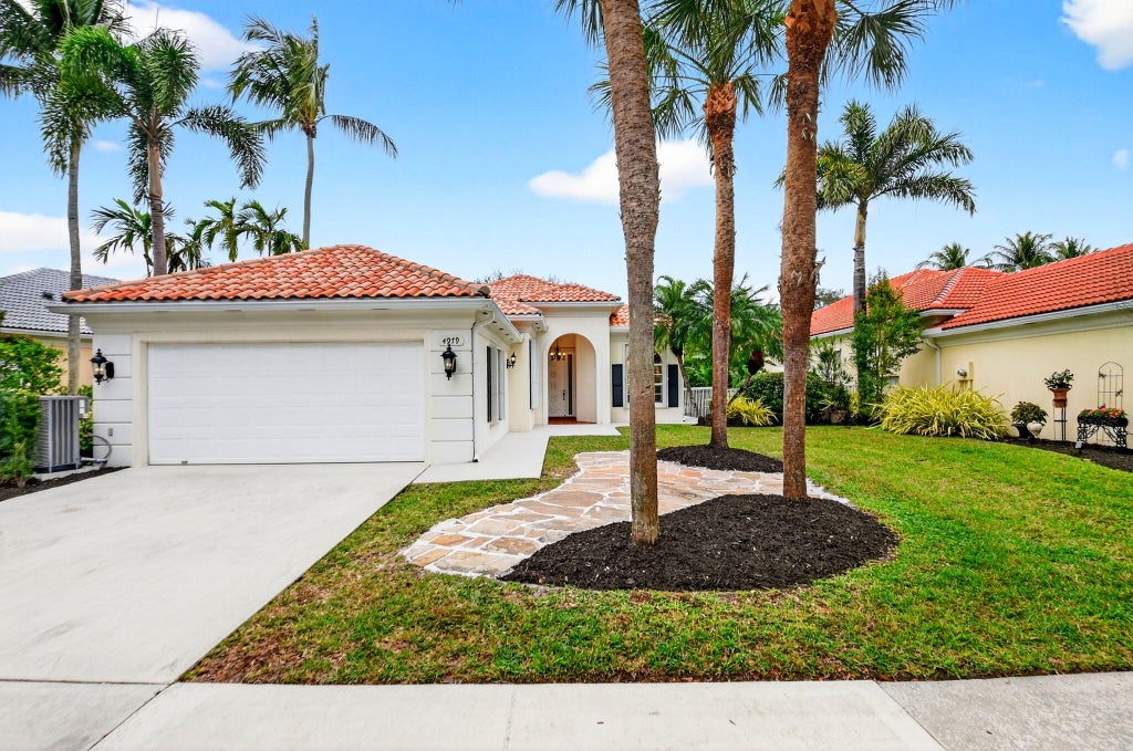 Photo of 4979 Garden Drive, Delray Beach, FL 33445 (MLS # R11156842)