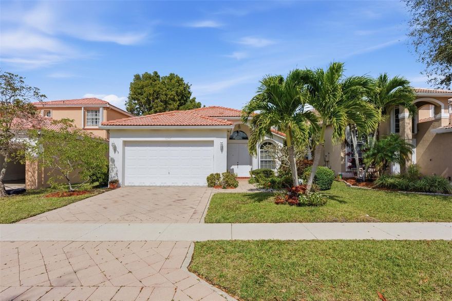 Located in the gated Mayfair subdivision of Wyndham Lakes, this move in ready home offers comfortable living in one of Coral Springs’ most desirable communities. Zoned for some of the best schools in Broward County with one of the lowest HOAs for a gated community in the area, this value can't be beat. The functional layout features generous living areas, an open kitchen overlooking the family room, a large primary suite with walk-in closets, and a well-appointed bath. The backyard has tropical landscaping ideal for relaxing or entertaining, plus the convenience of a 2-car garage. The community features a gated entry, community pool, and is extremely close to top-rated schools, parks, shopping, dining, and major roadways. A great opportunity to own in a quiet and safe neighborhood.