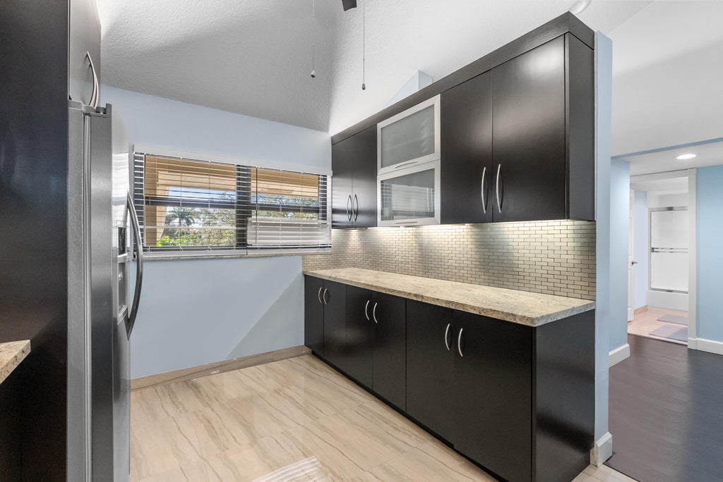 Photo of 6944 Briarlake Circle #205, Palm Beach Gardens, FL 33418 (MLS # R11136366)