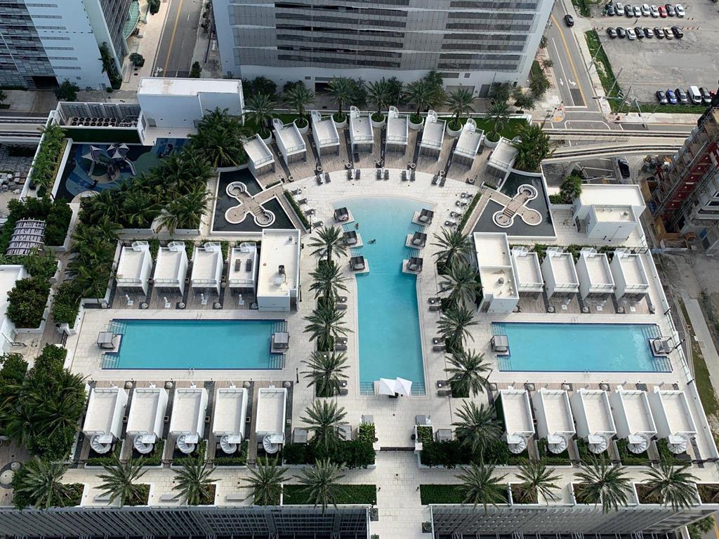 Upscale 3 bed/4 bath turnkey residence that is beautifully appointed (fully furnished) with stunning NE views overlooking Miami skyline & Biscayne Bay. Includes ALL utilities in the rental price. Features private entrance, floor to ceiling windows, 10 ft. high ceilings, white marble floors. Building amenities and services are second to none including 5 resort pools including rooftop, spa salon, fitness center, yoga, convenience store, tennis, soccer field, basketball, virtual golf, kids play area and much more. Great location close to Beaches, American Airline Arena, Museums, Entertainment, MIA, and the Brightline Train.