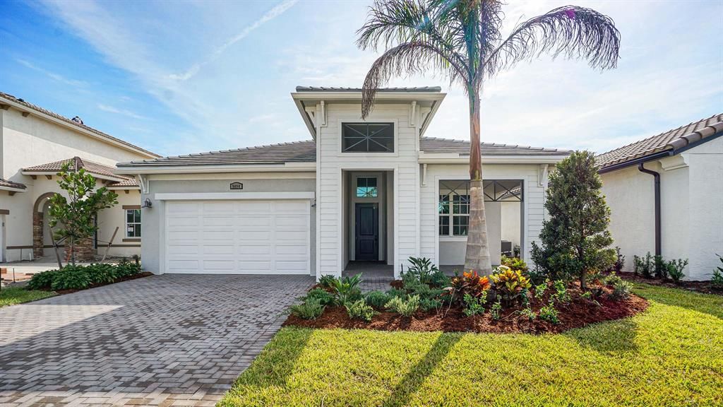 Photo of 9494 SW Pepoli Way, Port St Lucie, FL 34986 (MLS # R10852275)