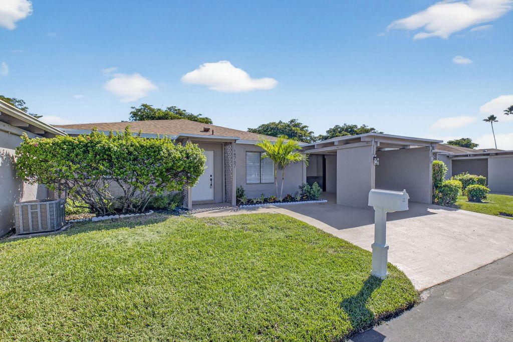 Photo of 14757 Wildflower Lane, Delray Beach, FL 33446 (MLS # B26013283)