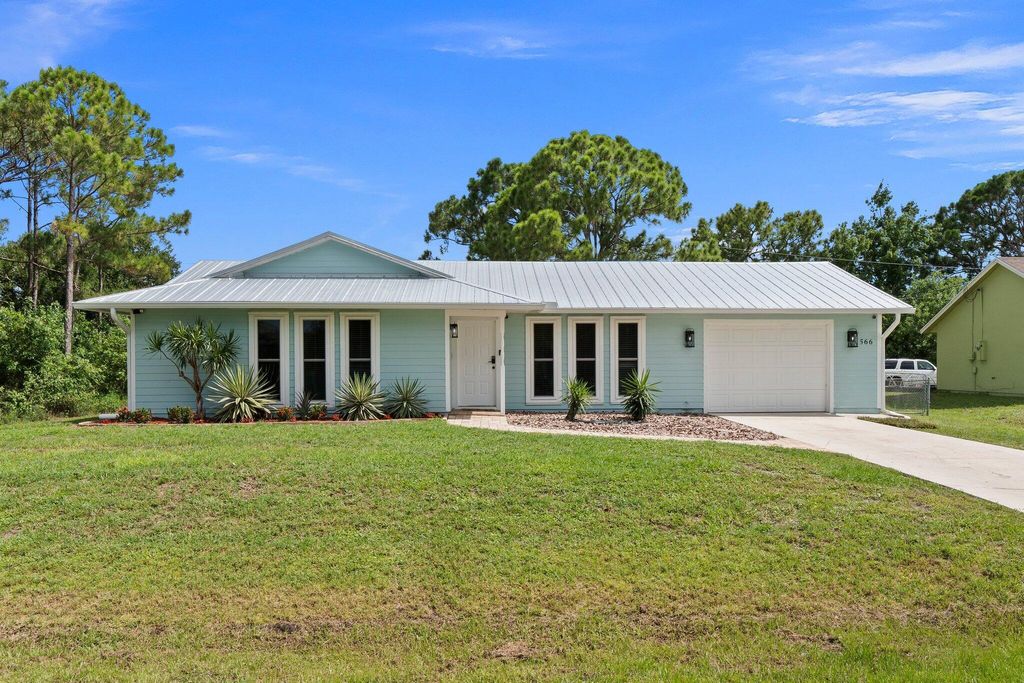 Photo of 566 SW Fairview Avenue, Port Saint Lucie, FL 34983 (MLS # R11037364)
