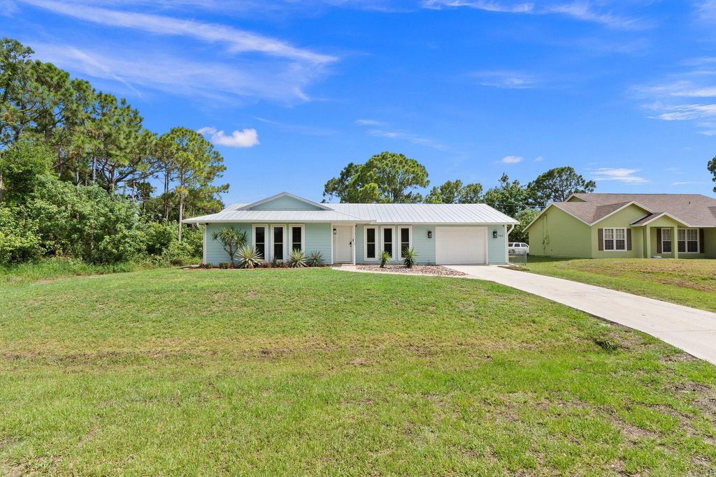 Photo of 566 SW Fairview Avenue, Port Saint Lucie, FL 34983 (MLS # R11037364)