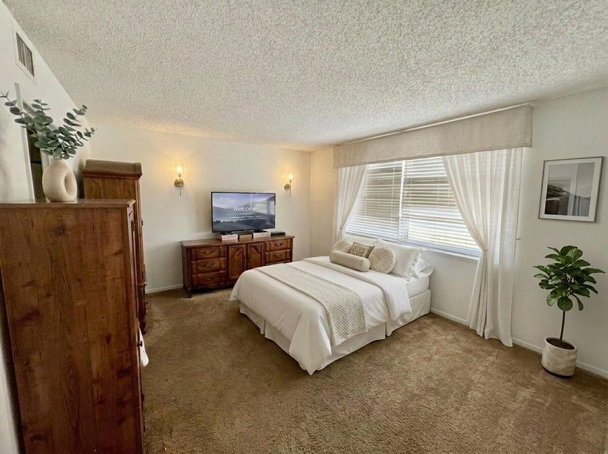 Spacious 2BR/2BA lakefront condo in desirable Palm Springs #2. This bright unit features a functional living and dining layout, entry-level bedroom access, and a screened balcony overlooking peaceful lake views. Interior highlights include tile and carpet flooring, central A/C, and in-unit washer and dryer. Enjoy a well-maintained community with amenities including a clubhouse, fitness center, pool, library, shuffleboard, extra storage, and vehicle wash area. Maintenance covers cable, internet, water, roof repairs, pest control, landscaping, and more. Conveniently located near shopping, dining, and major roadways—ideal for seasonal or year-round living.