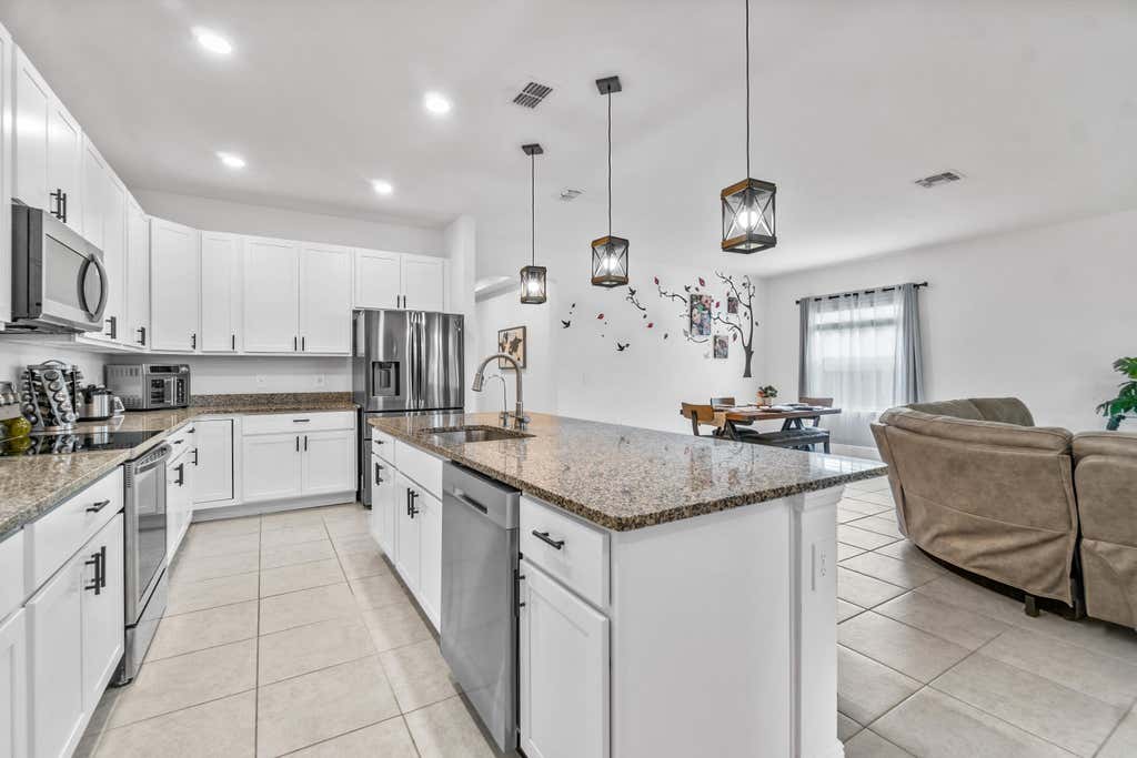 Photo of 1841 SW Clambake Avenue, Port Saint Lucie, FL 34953 (MLS # R10963829)
