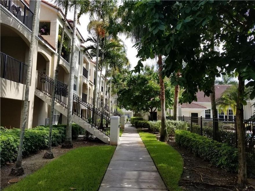 LOWEST PRICED 3/2, 1-CAR GARAGE TOWNHOUSE IN EXCELLENT AREA IN CORAL SPRINGS CLOSE TO MAJOR ROADS AND PLENTY OF SHOPPING, POPULAR POINCIANA PLACE - A GATED RESORT STYLE COMMUNITY THAT FEATURES A GRAND CLUBHOUSE WITH MANY AMENITIES. THE UNIT HAS ITS OWN GARAGE AND PRIVATE ENTRANCE TO THE SECOND FLOOR TO AN OPEN FLOORPLAN WITH LAMINATE FLOOR THROUGHOUT, OPEN KITCHEN, INVITING SCREENED IN PATIO, SPLIT BEDROOMS, WALK-IN CLOSETS, AND MORE.