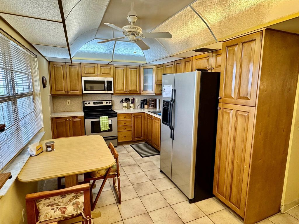 Photo of 3520 Oaks Way #807, Pompano Beach, FL 33069 (MLS # F10497801)