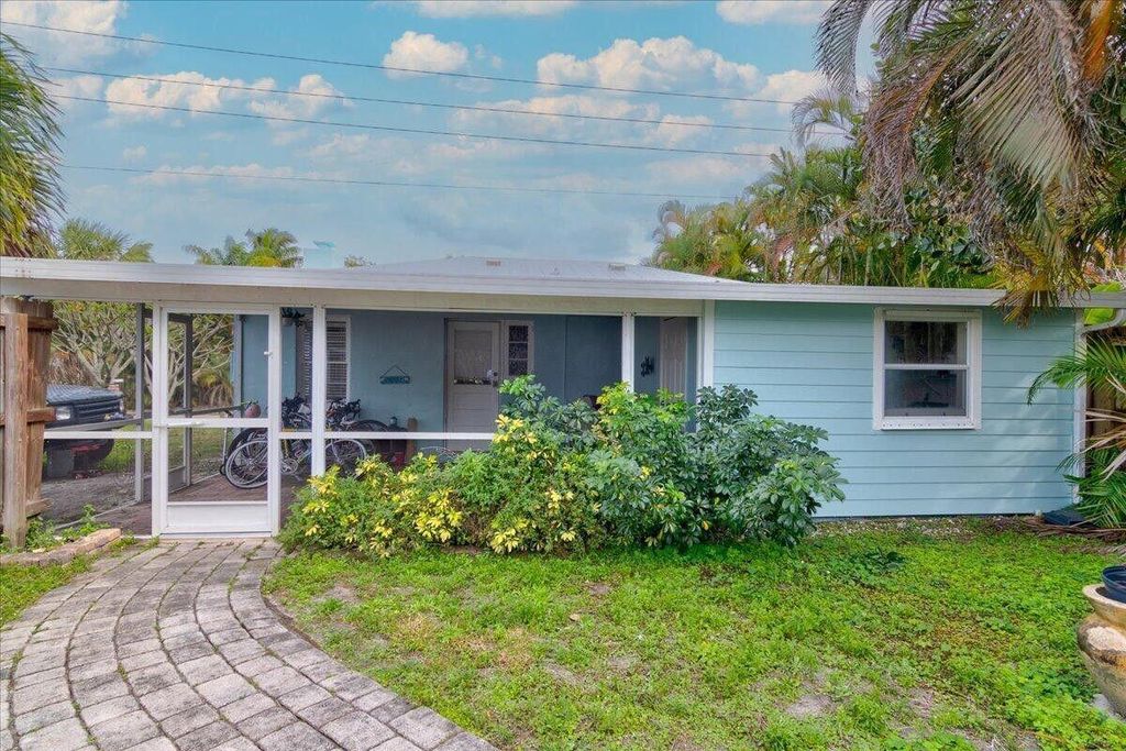 Photo of 866 SW 29th Terrace #Main House, Palm City, FL 34990 (MLS # R11125589)