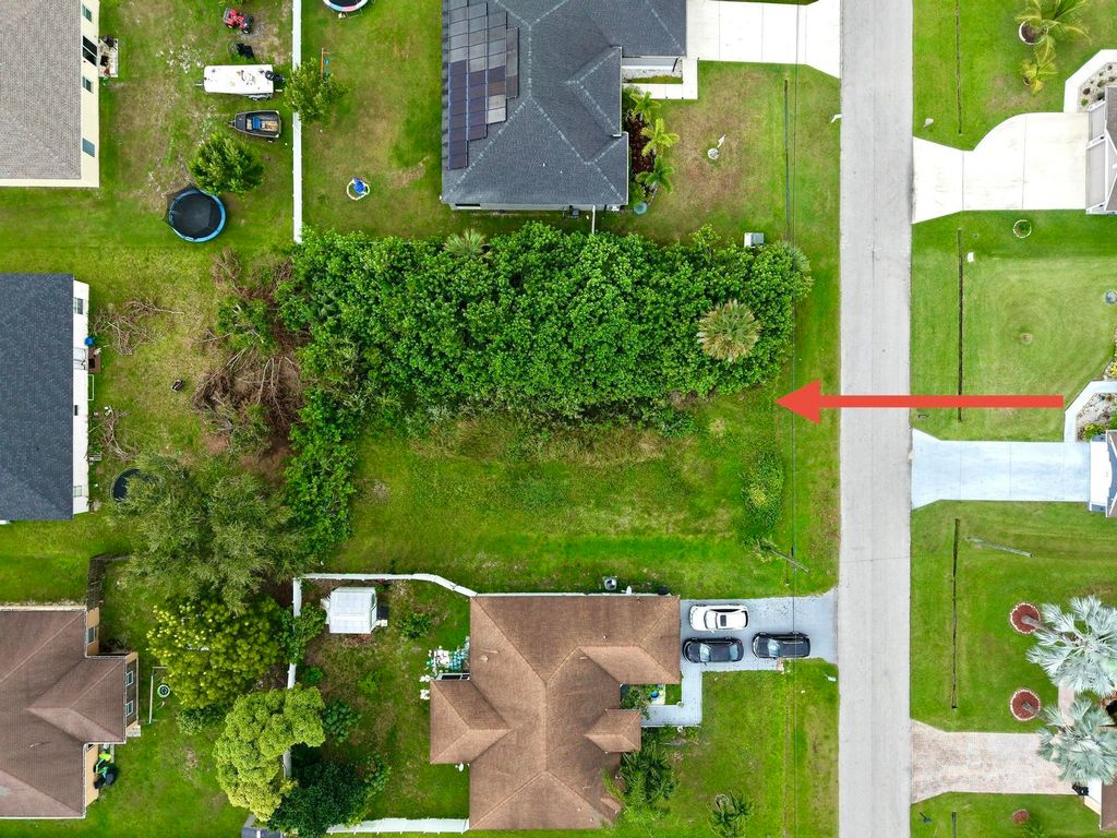 Photo of 1214 SW Medina Avenue, Port Saint Lucie, FL 34953 (MLS # R11121986)