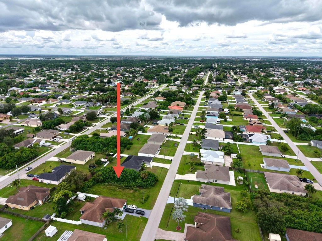 Photo of 1214 SW Medina Avenue, Port Saint Lucie, FL 34953 (MLS # R11121986)