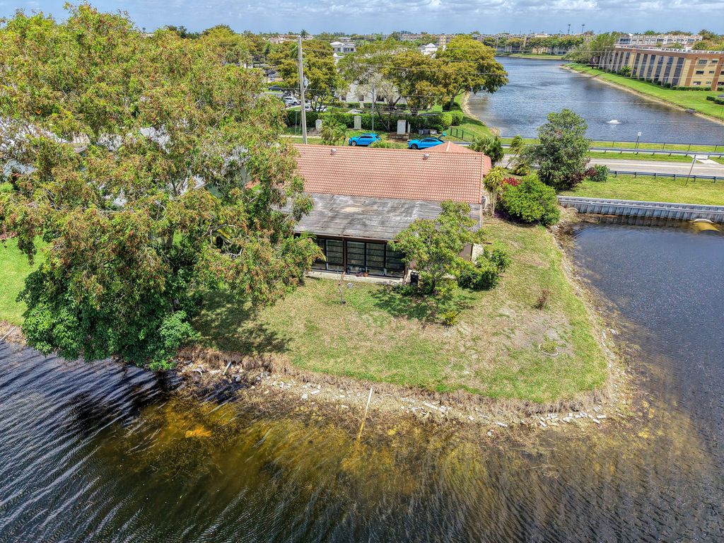 Photo of 10500 NW 71st Place, Tamarac, FL 33321 (MLS # B26018859)