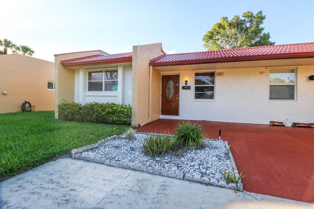 Photo of 107 Lake Anne Drive, West Palm Beach, FL 33411 (MLS # R10910091)