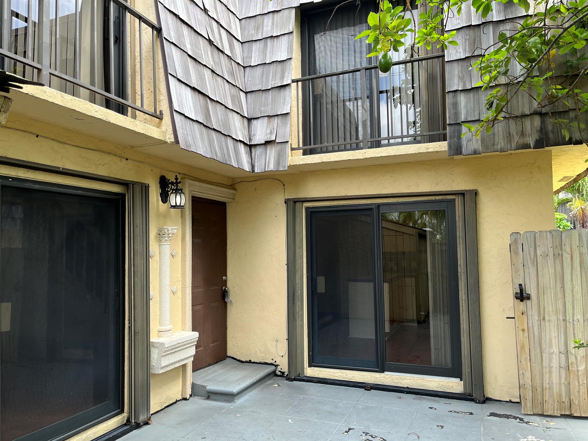 Great 2/2.5 Townhome with Impact Windows! Stainless Kitchen. Large, Private Fenced Patio.