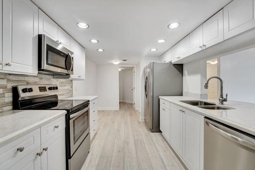 Photo of 2025 Lavers Circle #D504, Delray Beach, FL 33444 (MLS # R11080960)