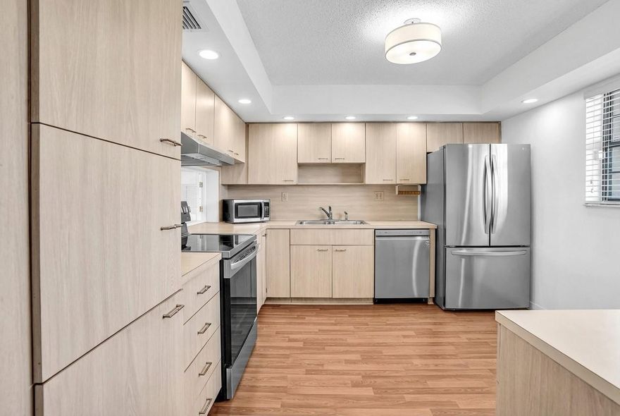 Motivated Seller! 55+ Community. Freshly painted! Welcome to this beautiful 2bd , 2ba Corner unit located on the 4th floor with a Lake view. This spacious and light-filled unit offers a thoughtful layout with generously sized bedrooms. Screened in Balcony facing the lake. Inside the apartment has a large laundry room. Roof (2022), Elevator (2025) The community has a pool, clubhouse and fitness room. Close by all shoppping areas and highways. Some photos have been virtually staged