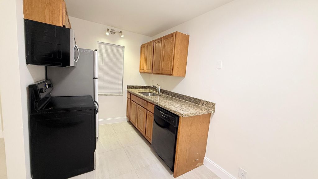 Photo of 607 NE 29th Drive #17, Wilton Manors, FL 33334 (MLS # B26023710)