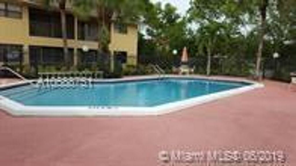 Photo of 2953 Riverside Dr #2953, Coral Springs, FL 33065 (MLS # F10320580)