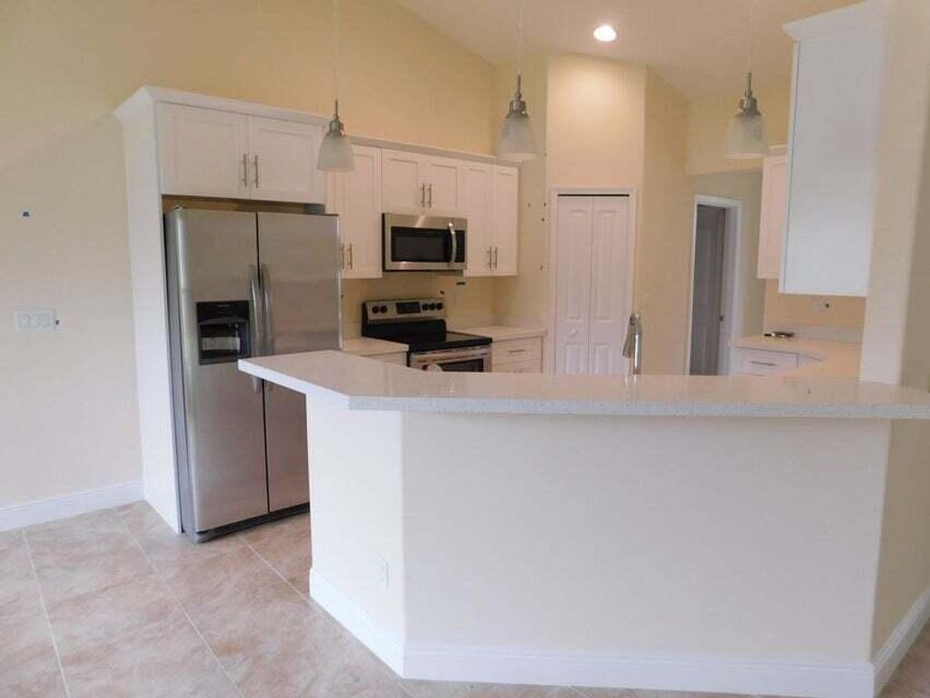 Photo of 1650 SW Sylvester Lane, Port Saint Lucie, FL 34984 (MLS # R11074641)