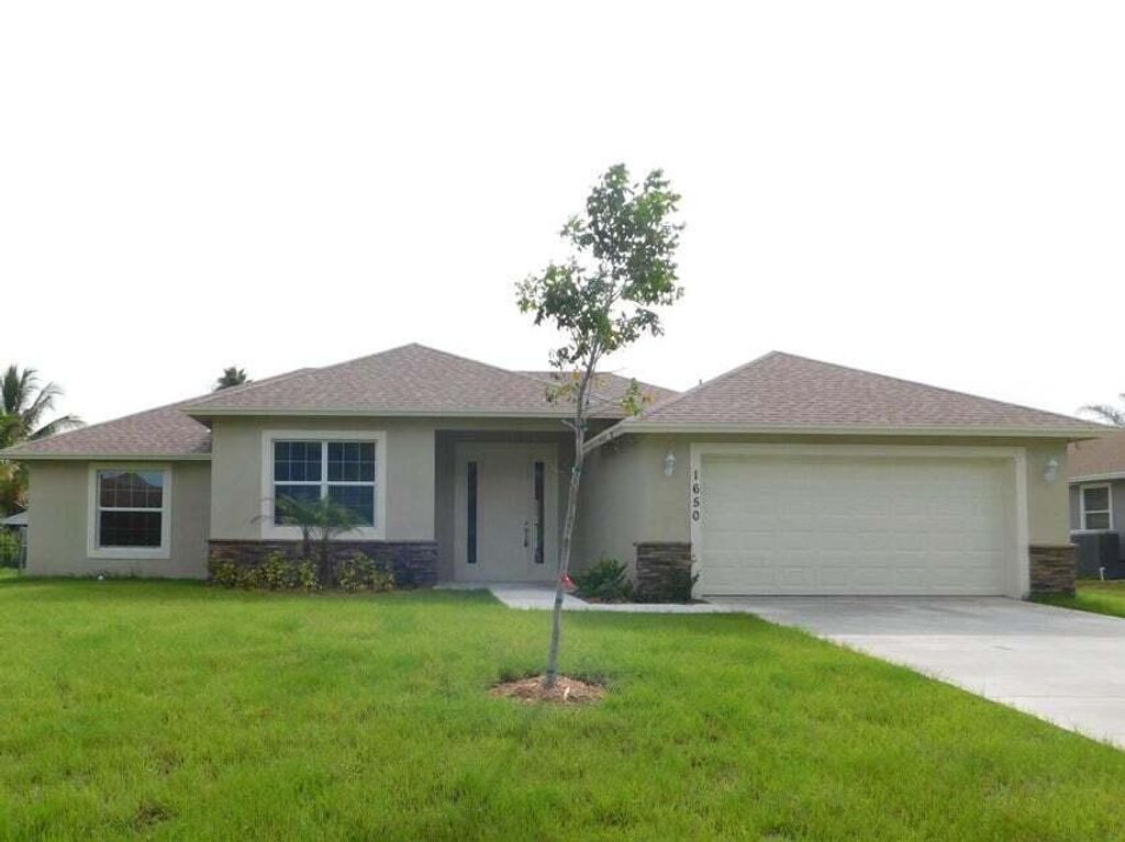 Photo of 1650 SW Sylvester Lane, Port Saint Lucie, FL 34984 (MLS # R11074641)
