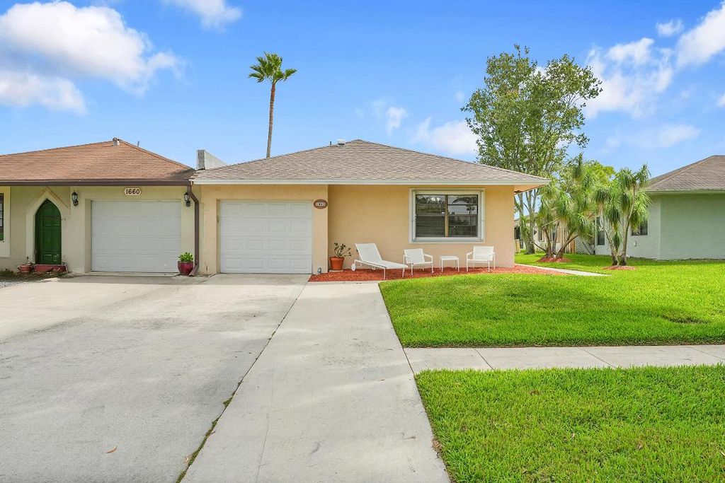 Photo of 1662 Granfern Avenue, West Palm Beach, FL 33415 (MLS # R11129466)