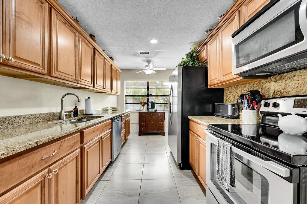 Photo of 1662 Granfern Avenue, West Palm Beach, FL 33415 (MLS # R11129466)