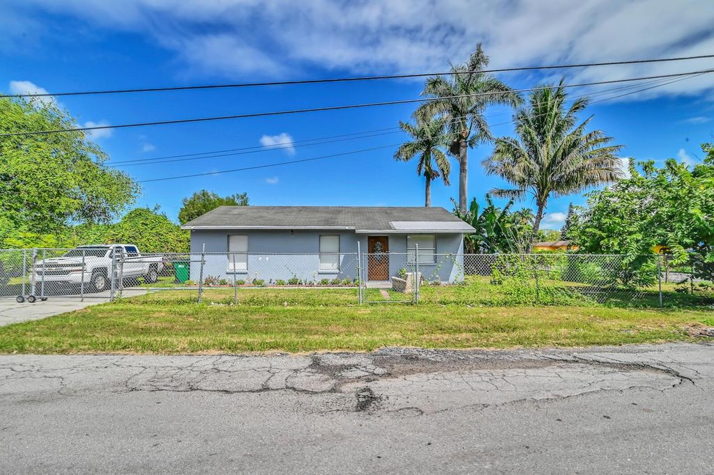 Photo of 201 NW 3rd Avenue, South Bay, FL 33493 (MLS # R10892549)
