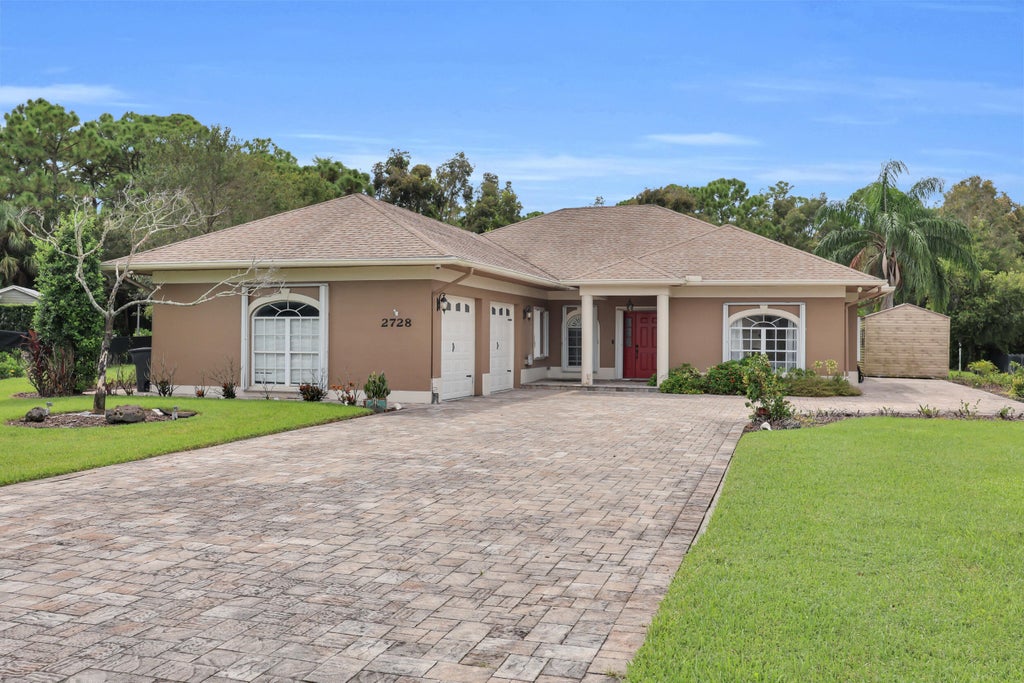 Photo of 2728 SERENITY Circle S, Fort Pierce, FL 34981 (MLS # B26080205)