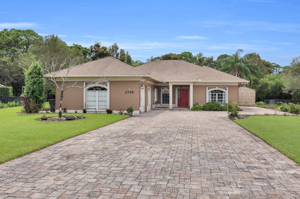 Photo of 2728 SERENITY Circle S, Fort Pierce, FL 34981 (MLS # B26080205)