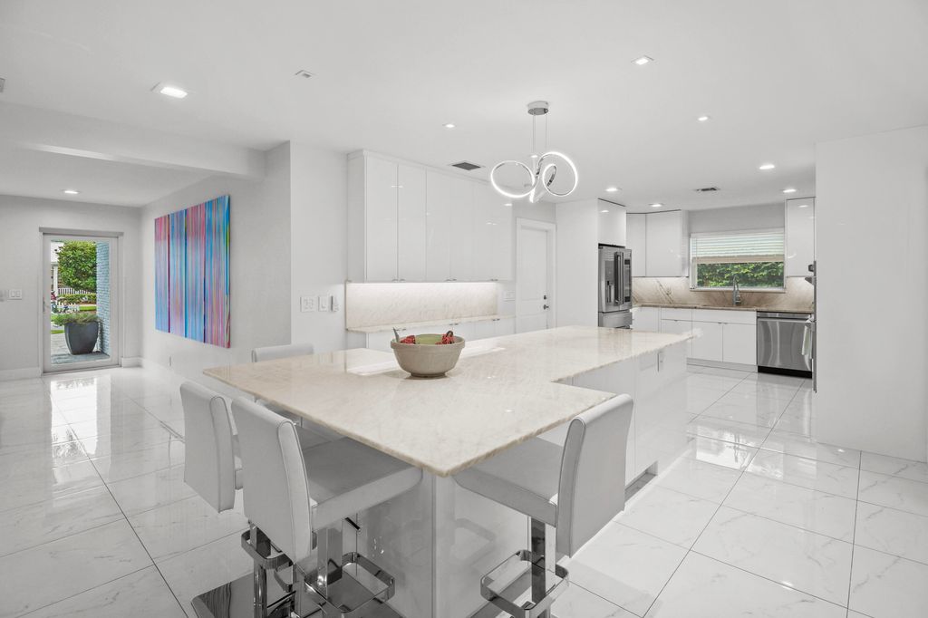 Photo of 337 Cascade Lane, Palm Beach Shores, FL 33404 (MLS # R11120261)